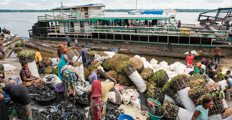 Producers from Yanonge prepare a charcoal shipment