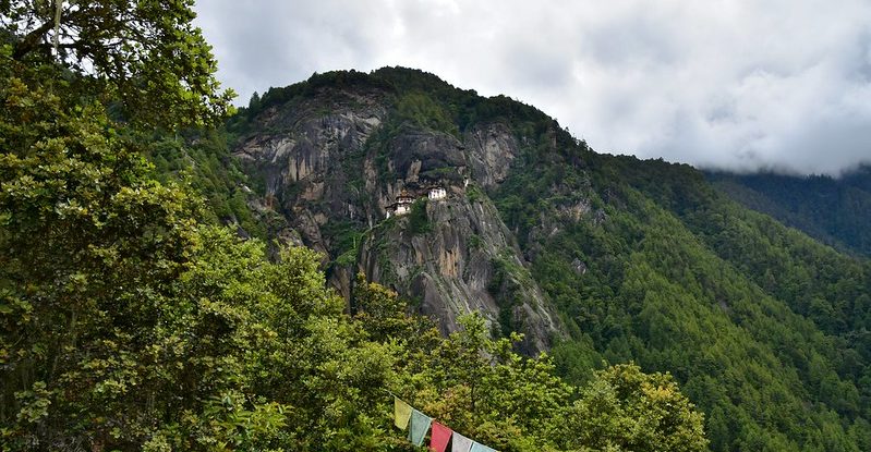 View of a monastery on a forested hillside
